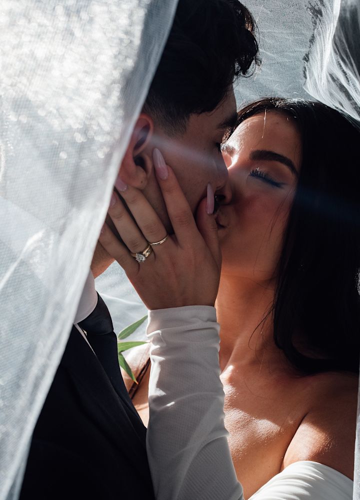 bride and groom kissing