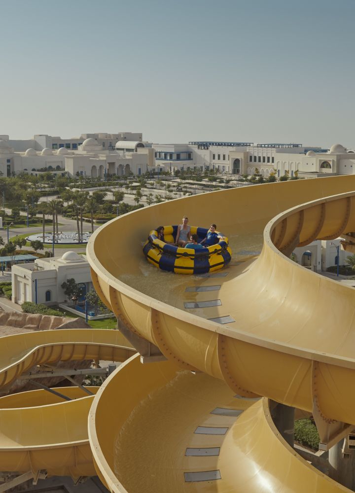 Large slides, with people on their way down