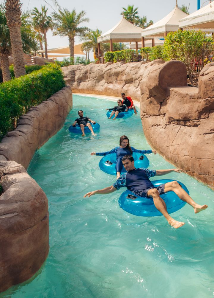 People on inflatables in water