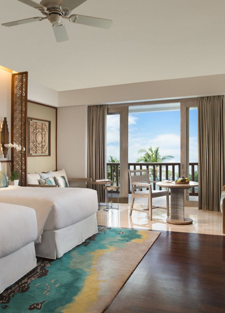 2 beds with tv and sitting area