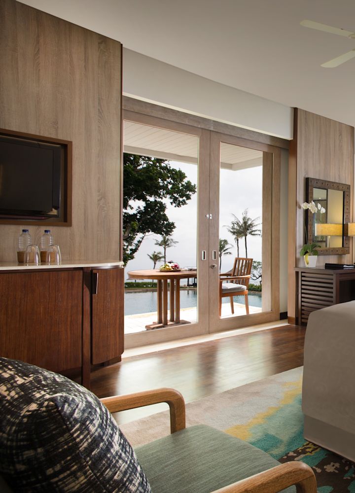 Bed with TV and chair