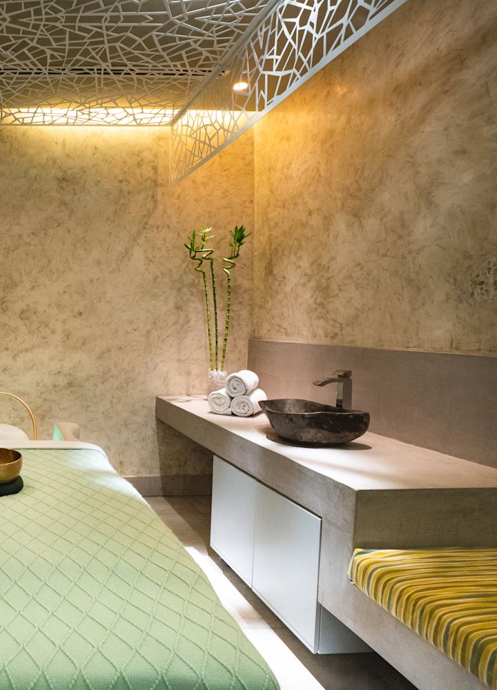 A massage table in a relaxing room at the spa