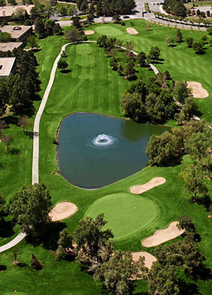 Aerial View of a Golf Course with a Fountain in a Pond - Hole 11