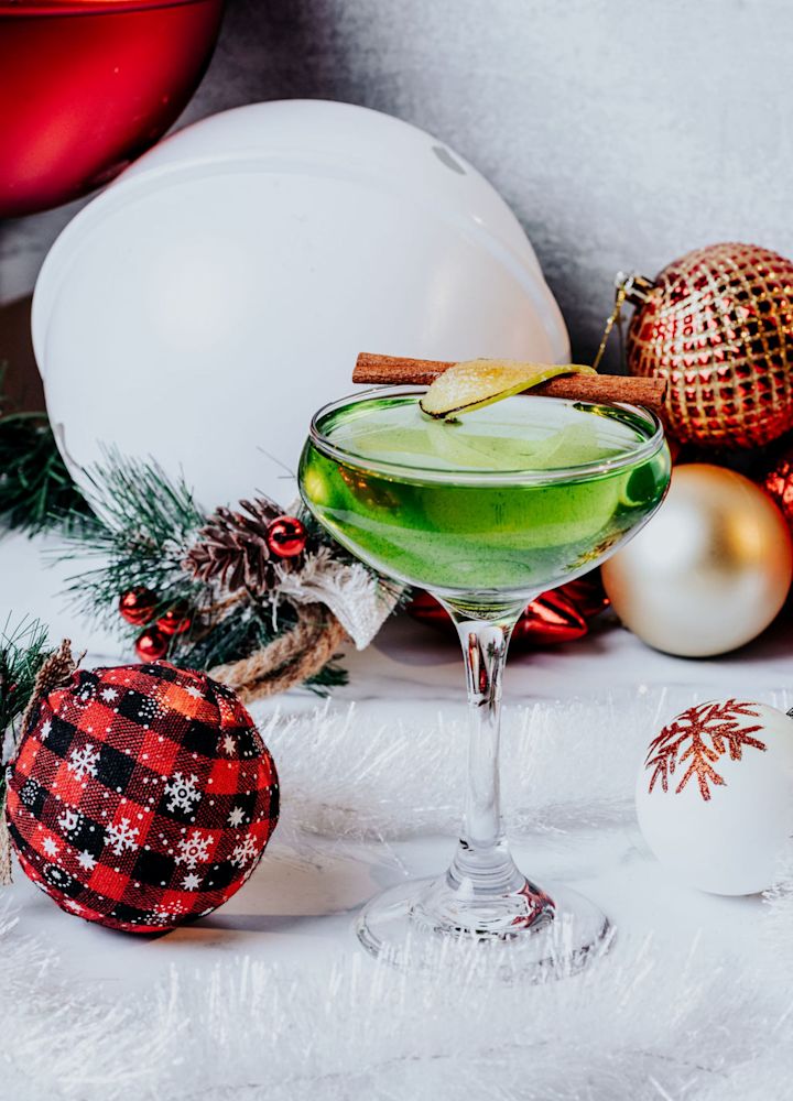 Cocktail Glass on a Table with Christmas Decorations