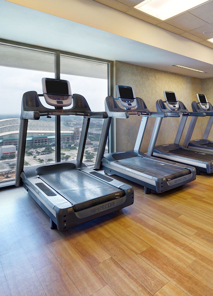 Fitness Center with Treadmills and Cross-Trainer Machines