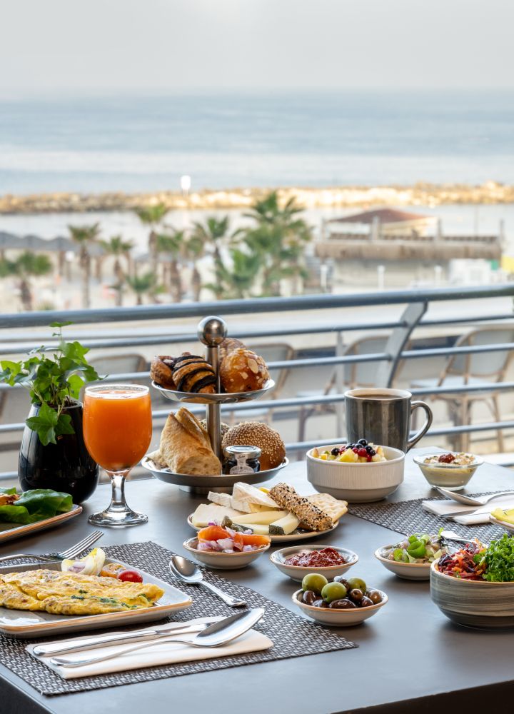 cafe med breakfast table with food and drinks