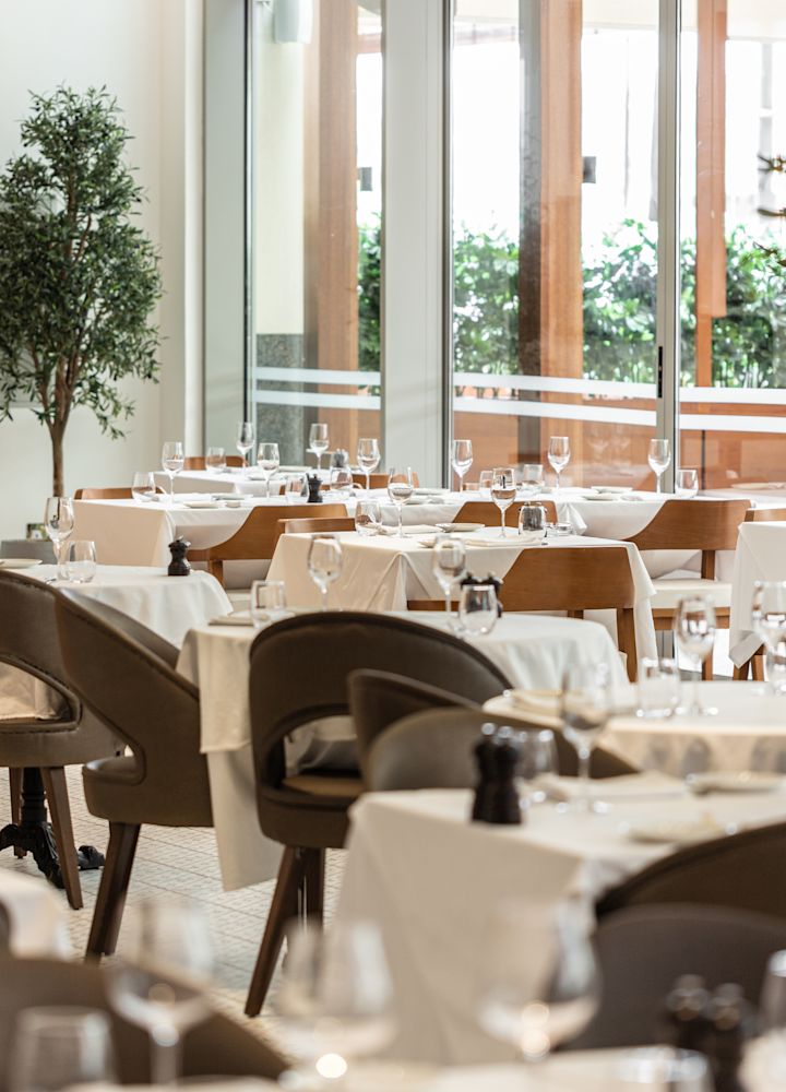 Il Pastaio Restaurant, tables set up with white table cloths