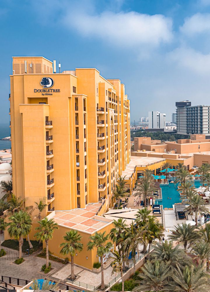 drone shot of resort and beach