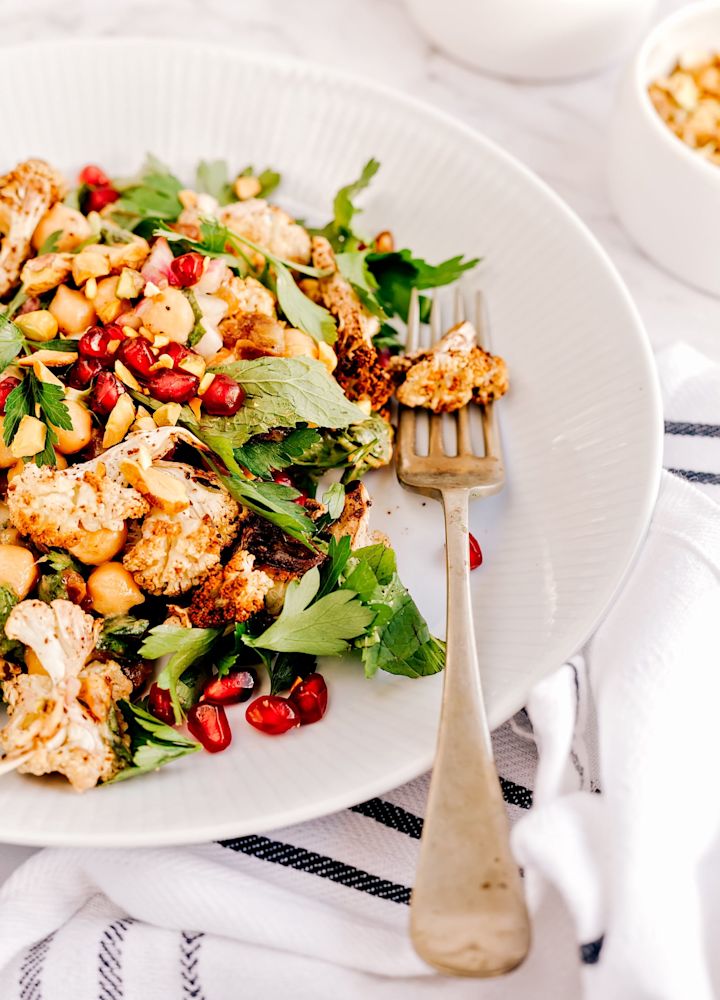 Closeup of a plate of salad and a fork