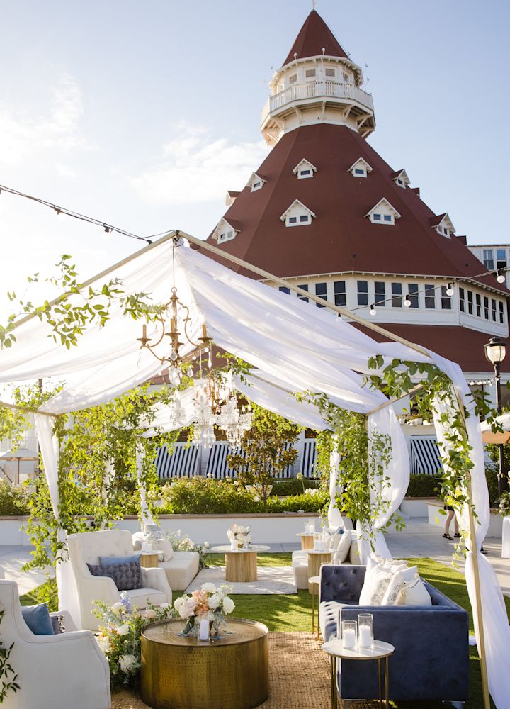 Vista Terrace floral seating setup outdoors with building in background