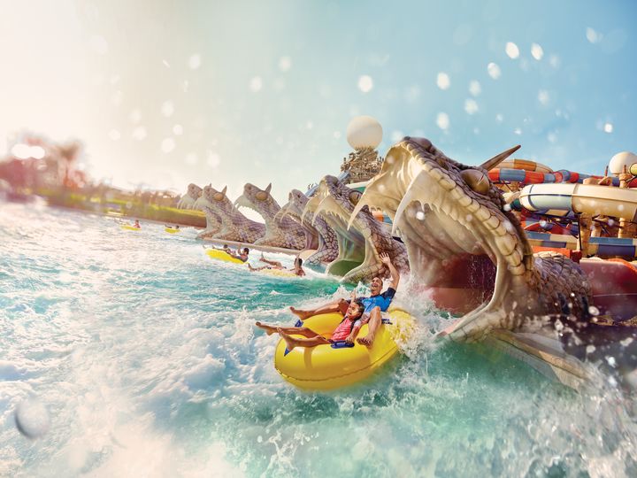 a group of people on a ride at Yas Waterworld