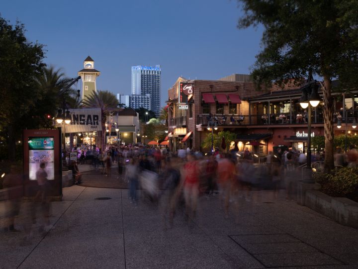 disney springs with people walking around