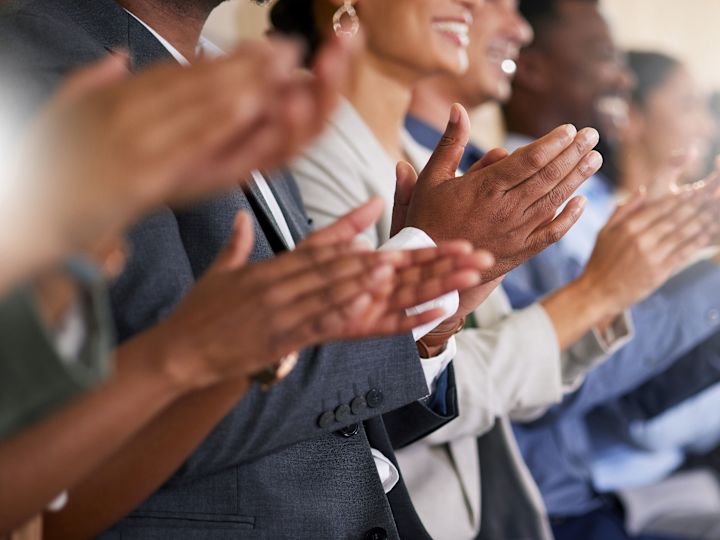 Stock image of people clapping