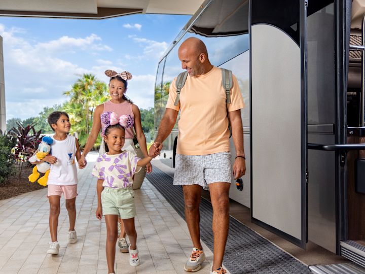 family getting on the shuttle