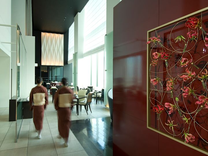 Mitarbeiter beim Betreten des Restaurants