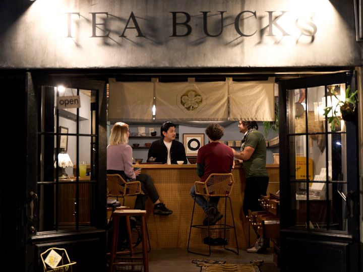 People Enjoying Drinks at Tea Buck
