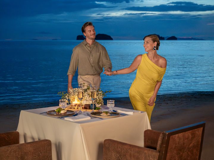 Couple Dining by the Beach
