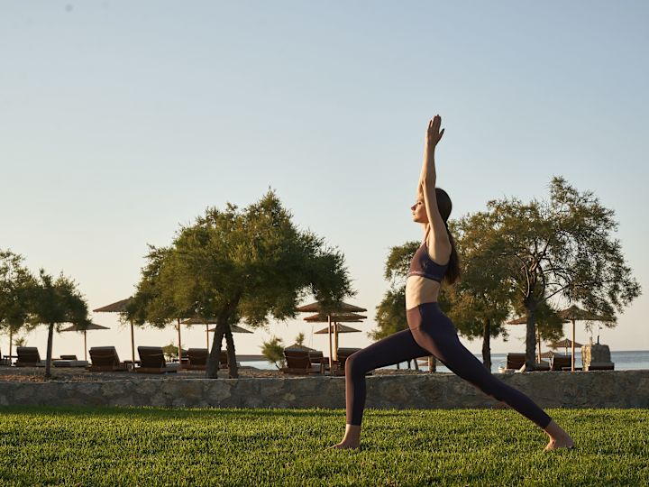 Woman Practicing Yoga Outdoors