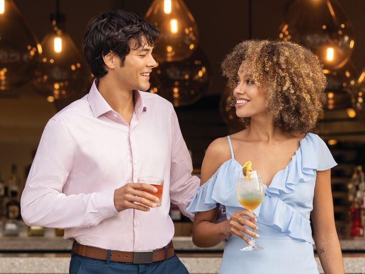 Couple Enjoying Drinks at Ox and Ocean Bar