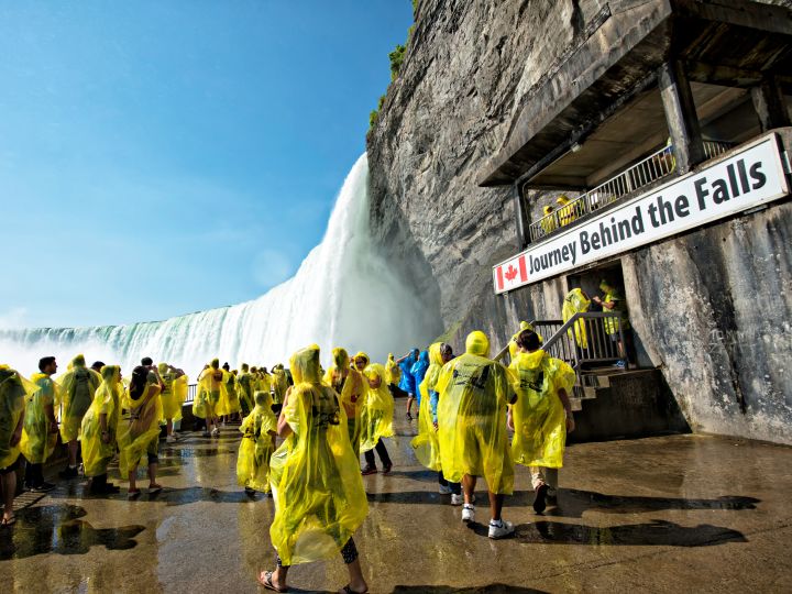 People Enjoying a Tour Behind Niagara Falls
