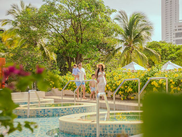 a Family Enjoying a Day at the Pool