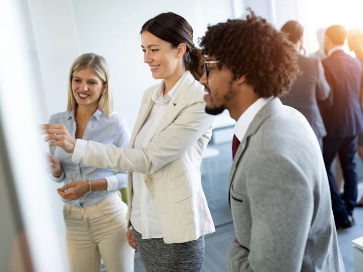 a Group of People Having a Meeting in the Lobby Area