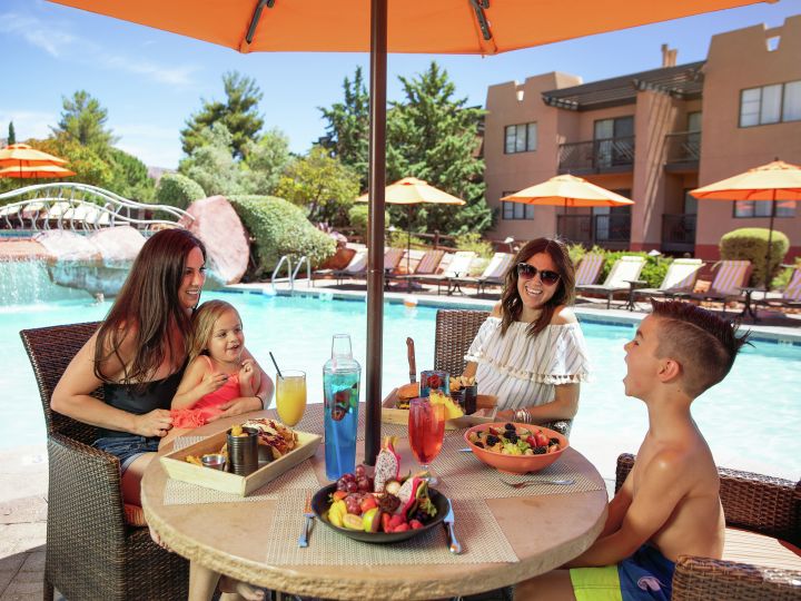 Family Dining by the Pool in Outdoor Area