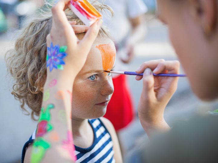 Kids getting face painted