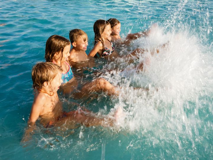 Kids splashing in water