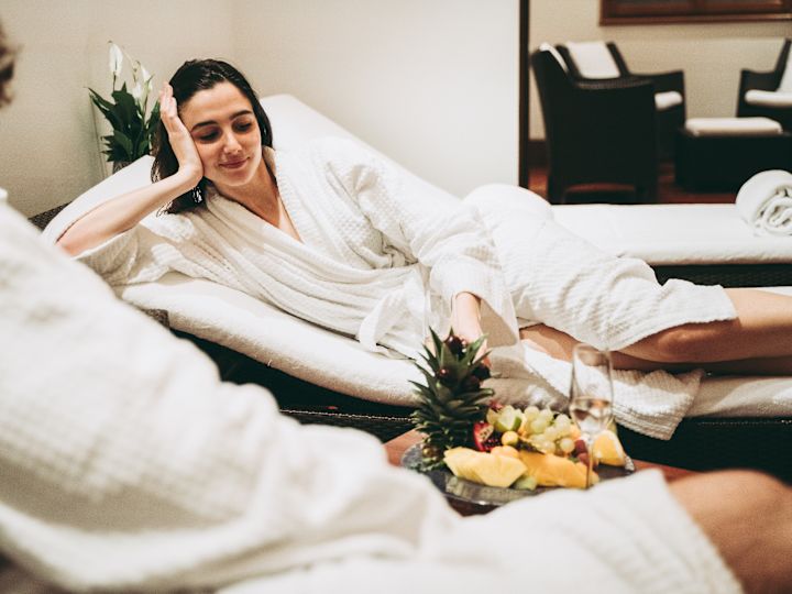 Woman relaxing in spa robes