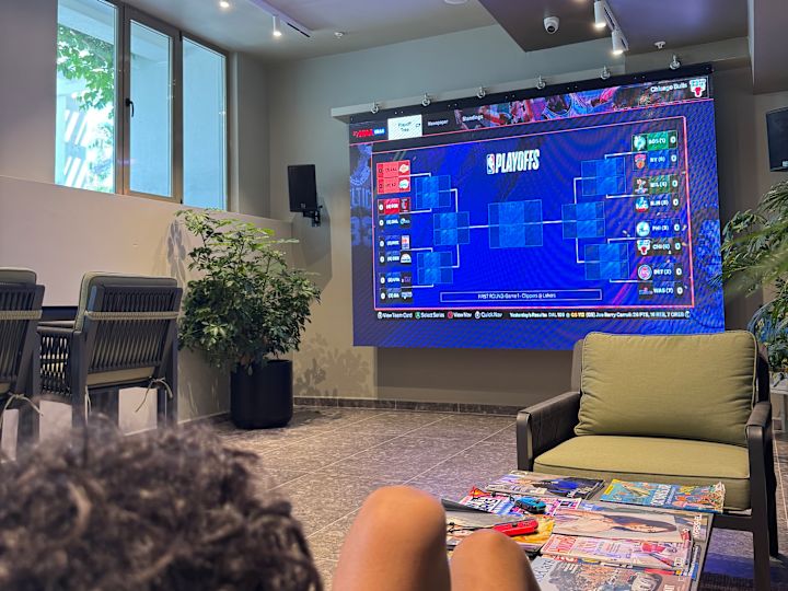 Teenager Playing a Game at the Youngster Club