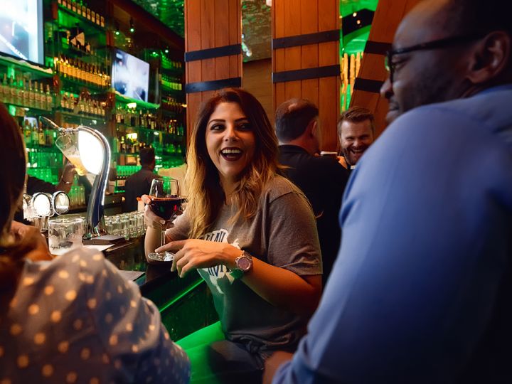Group sitting at bar in McGettigans
