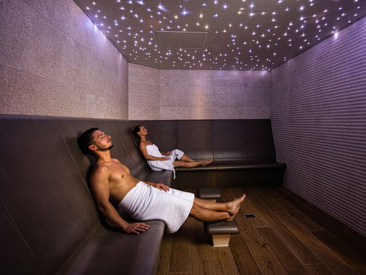 guests relaxing in the sauna