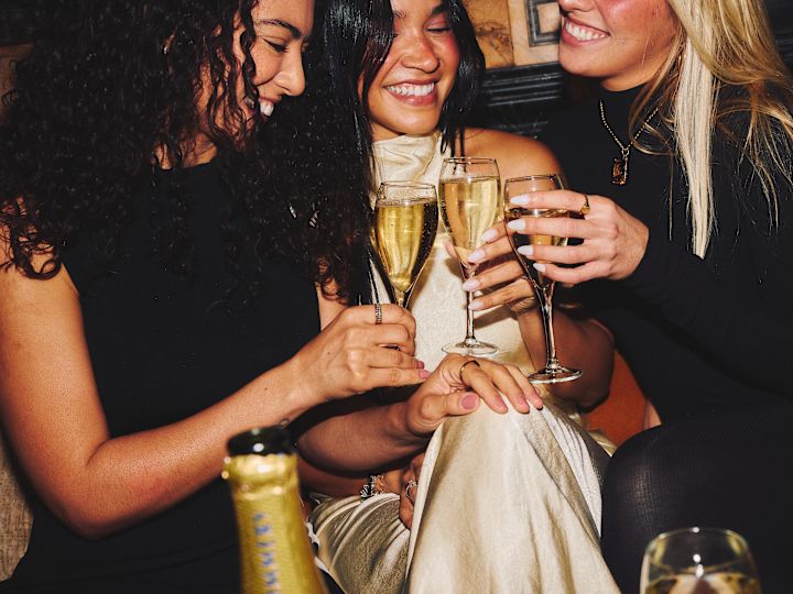 marble bar guests toasting with champagne