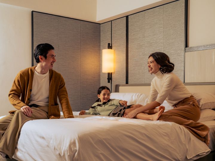 Happy Family in Guest Room