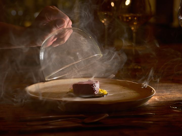 Chef and Steak Dish