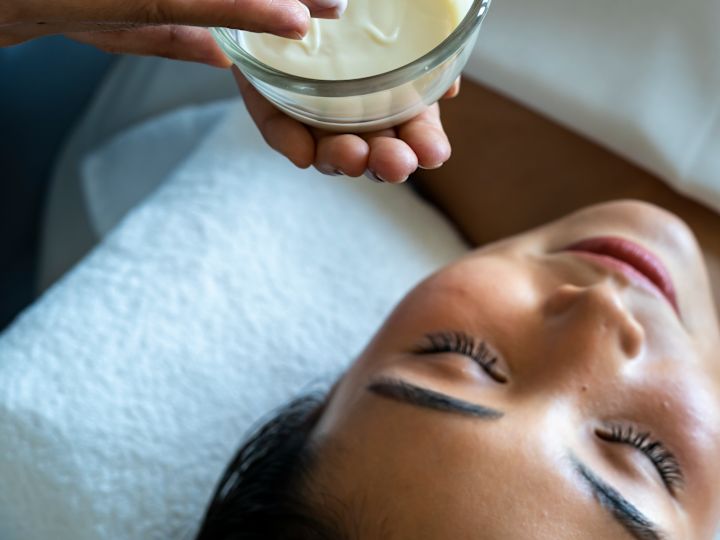 Person about to receive spa cream treatment