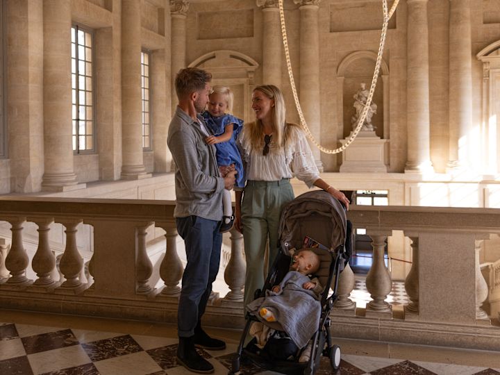 Family in a Hotel Corridor