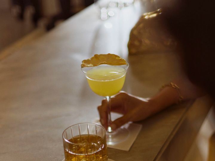 Woman and man enjoying drinks at the bar