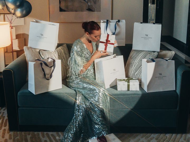 guest opening christmas gifts