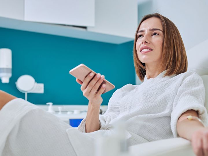 a Woman Sitting on a Chair at a Beverly Hills Clinic