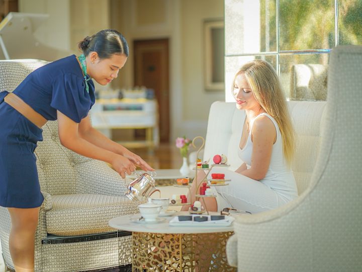Afternoon Tea staff and guest