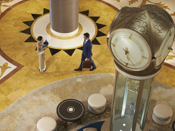Two People Meeting in Personal Concierge Service Lobby Area