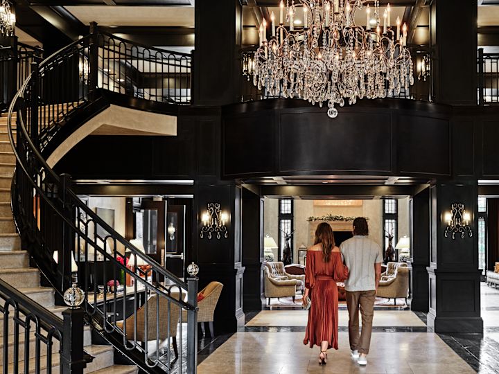 Couple Walking in Lobby Area
