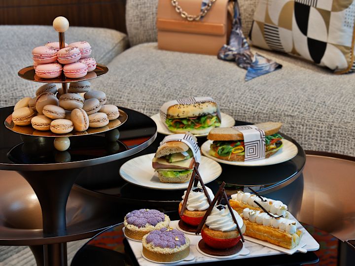 Sandwiches and Dessert on a Table at Cafe TOMO