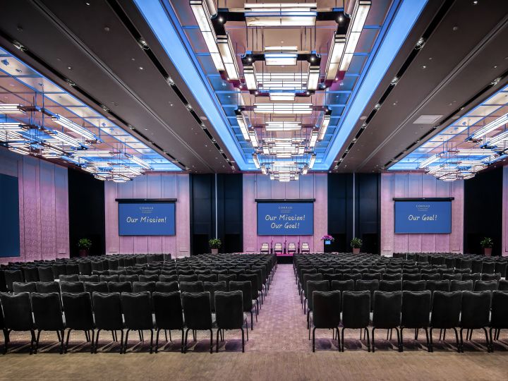 Ballroom with chairs and projectors