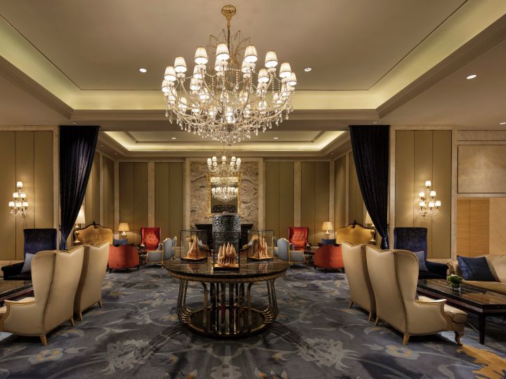 Bar area with comfortable seating and chandelier