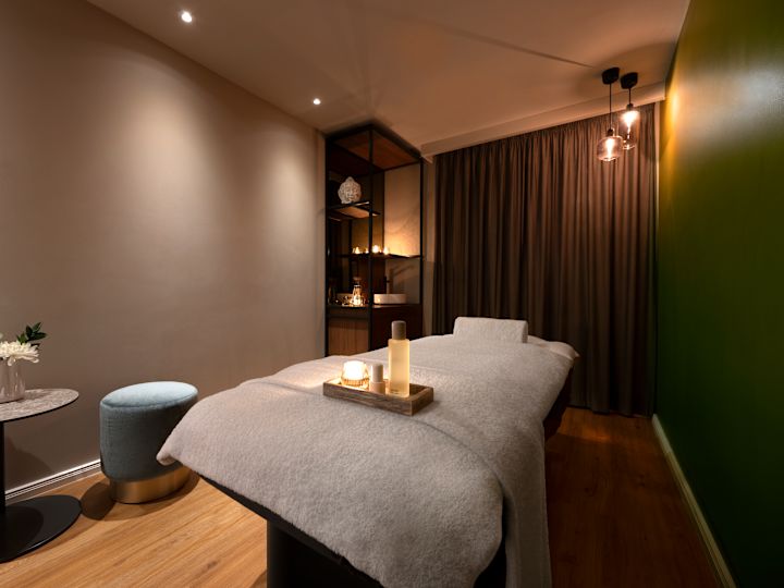 Massage Bed with Spa Products  on a Tray