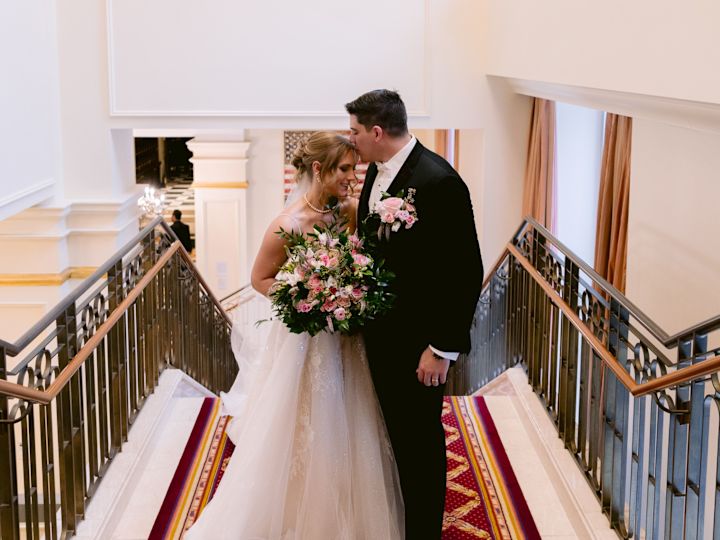 Couple Standing in a Staircase on Their Wedding