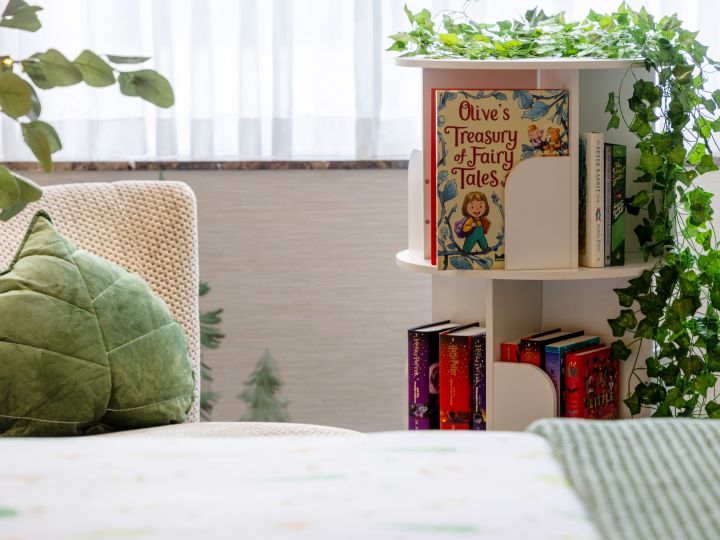 Leaf pillow, chair and bookshelf with children's books